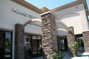 The image shows the exterior of Inland Dental , a dental office.