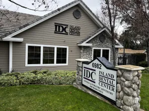The image shows the exterior of Inland Dental Center , a dental office.